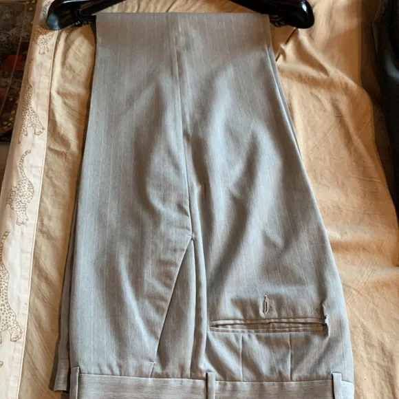 Light gray suit with baby blue pinstriped. 42L